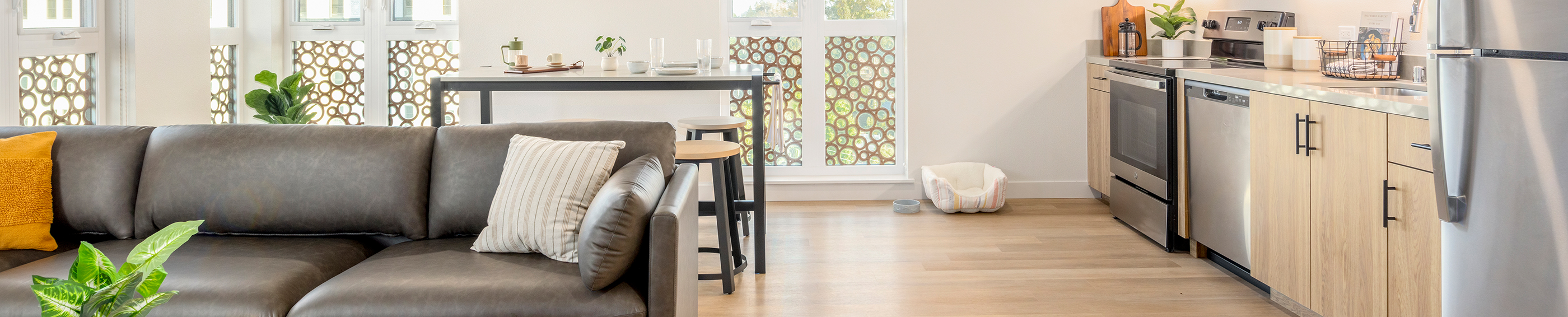 A living room next to a kitchen